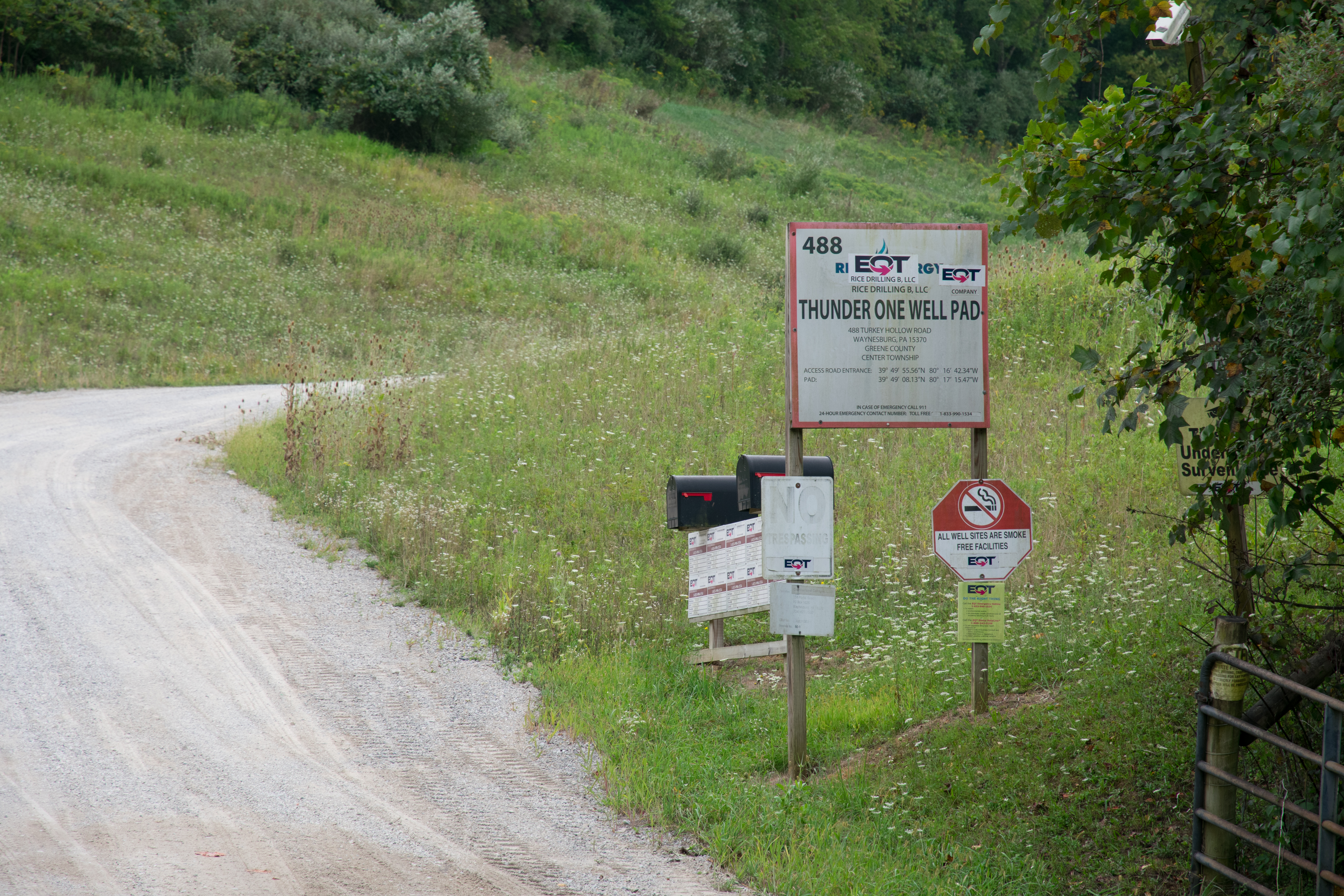 I drove by hundreds of signs like these for the EQT PLHC Pad (left) and Thunder One Well Pad (right). Most well pads themselves aren’t visible from the road, and these signs are often the only indication from the ground that they are there.
